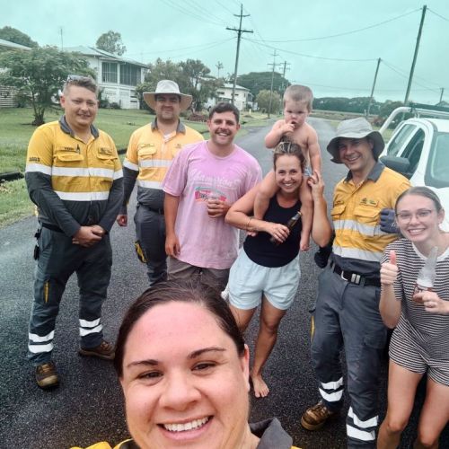 Ergon crews with customers at Marina Parade standing in middle of road