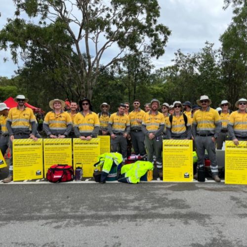 Ergon crews lined up for group photo in uniform