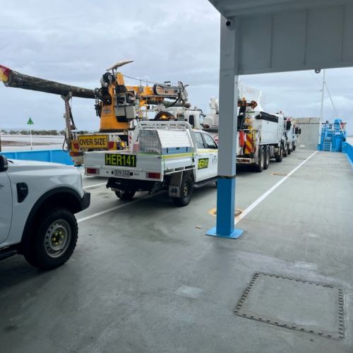 Cars and trucks on ferry across to the Bay Islands