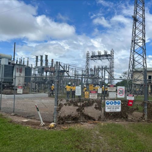 Ergon crews inside the Ingham substation