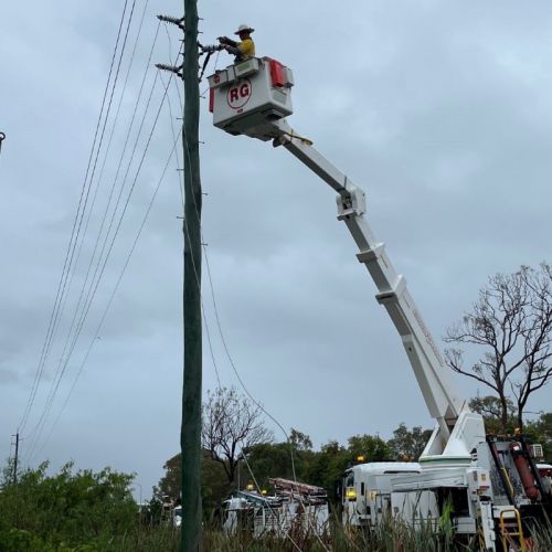 Crew in cherry picker working on powerlines