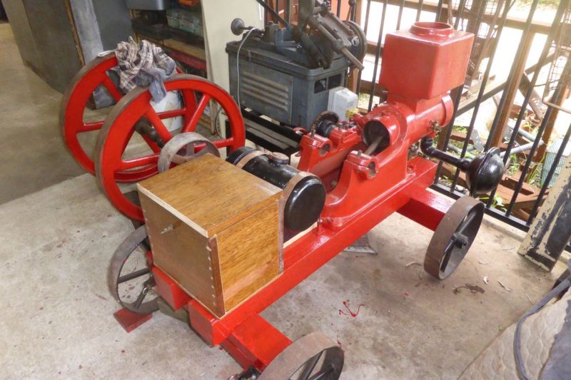 Red antique machine under construction