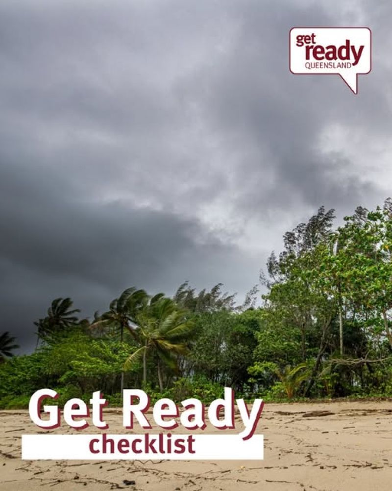 Beach with windy palm trees and grey clouds for Get Ready Checklist