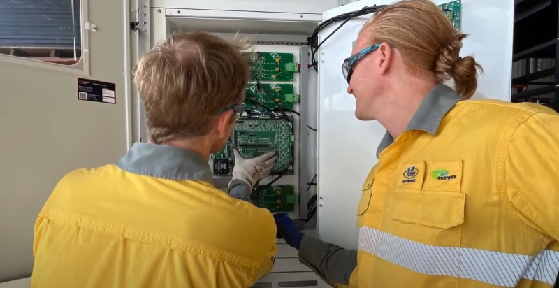 Field crew testing a system inside the microgrid facility