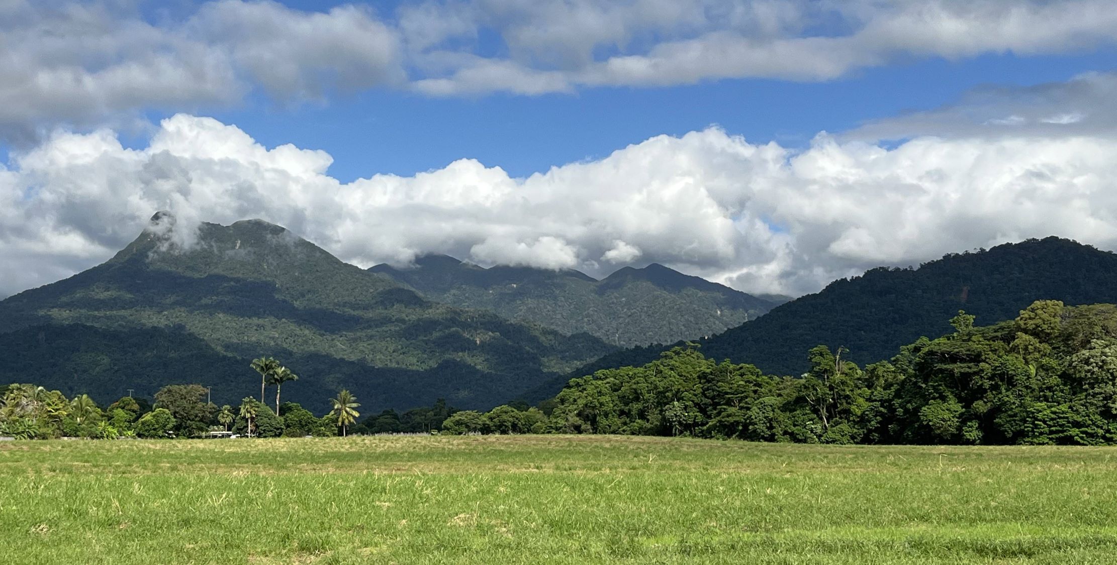 Mountains in the Mossman area with blue sky and clouds