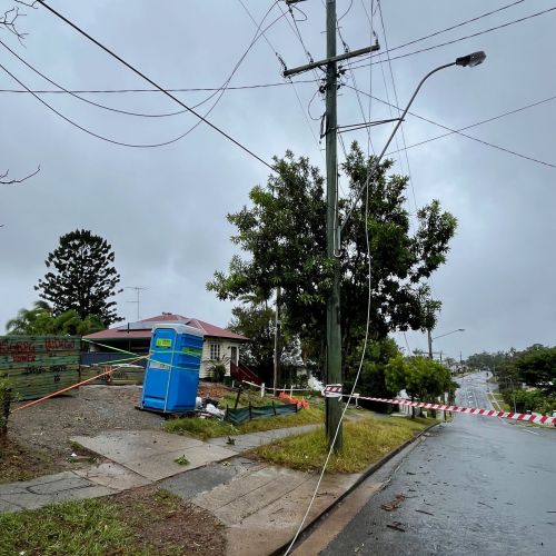 Powerlines down across a driveway at Upper Mount Gravatt